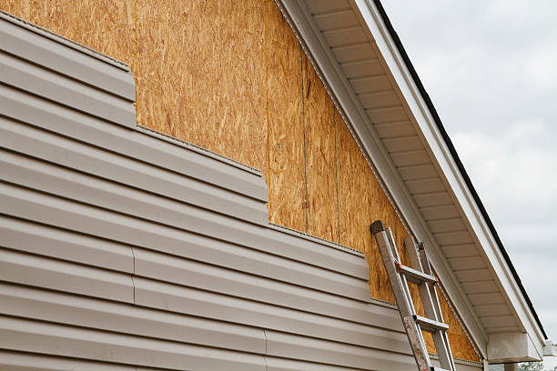 Professional Emergency Siding Repair technician working in Cross Fork, PA